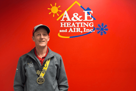 An A&amp;E technician wears the A&amp;E 2024 Gold Best of the Gorge medal.