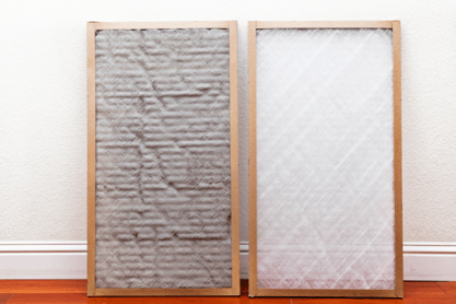 On the left is a dirty, dusty filter. On the right is a brand new, white filter.