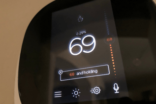Wall-mounted Ecobee Smart Thermostat Premium.