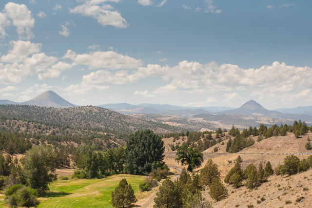 A shot of Eastern Oregon and Grass Valley, showing high desert and sparce trees.
